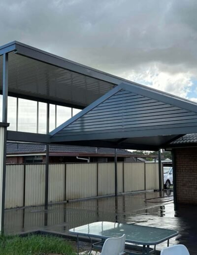 Custom gable awning installed on residential property